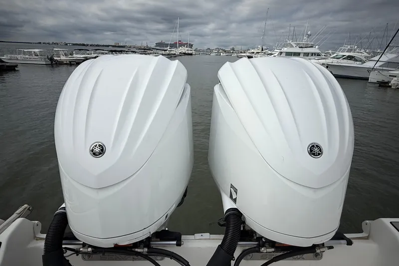  Yacht Photos Pics Twin Yamaha outboard engines on a 2022 Sea Fox 288 Commander boat in a marina.