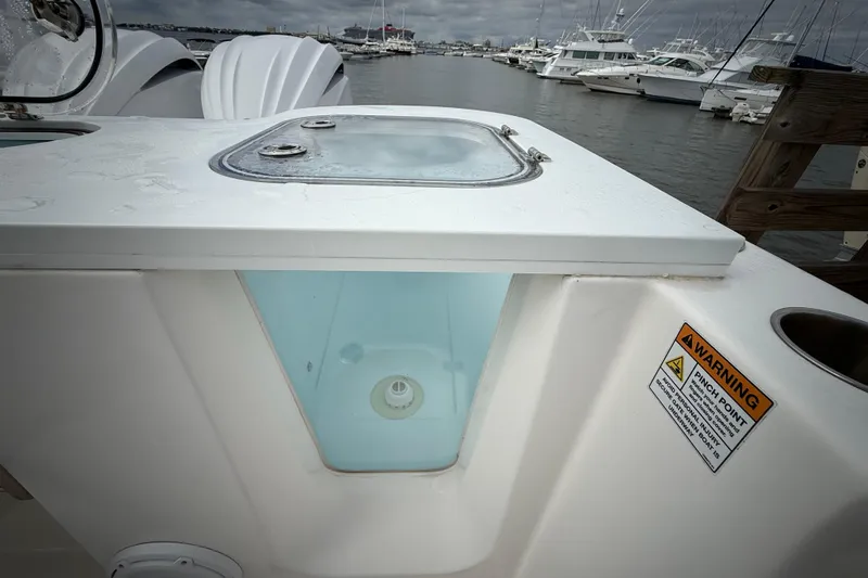  Yacht Photos Pics 2022 Sea Fox 288 Commander boat with livewell and warning label at marina.