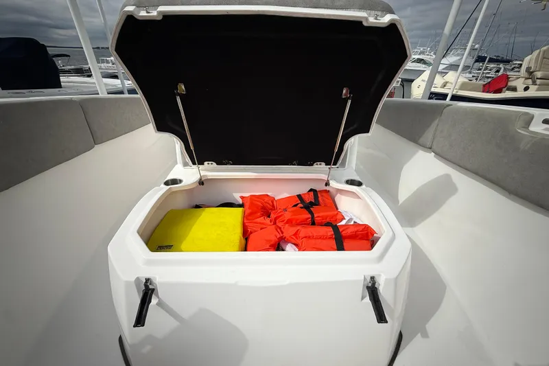  Yacht Photos Pics Open storage compartment on 2022 Sea Fox 288 Commander with life jackets inside.
