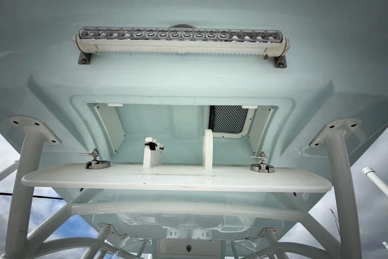  Yacht Photos Pics 2022 Sea Fox 288 Commander boat interior view with storage compartment and LED light.