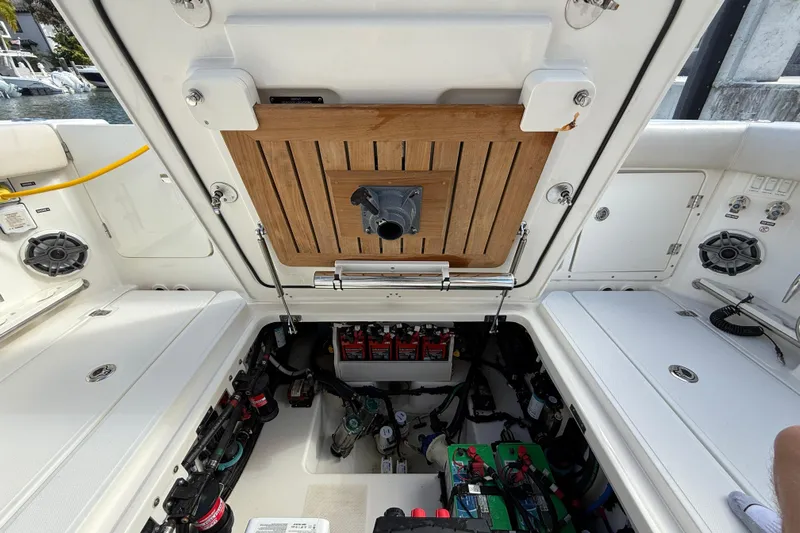 Gail Force Yacht Photos Pics 2023 Boston Whaler 360 Outrage engine compartment with batteries and wiring.