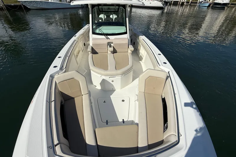 Gail Force Yacht Photos Pics 2023 Boston Whaler 360 Outrage boat with spacious seating and sleek design.