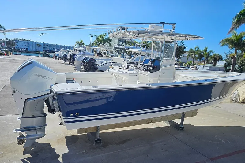  Yacht Photos Pics 2007 SeaCraft SC32 Master Angler boat with Mercury engine, docked under clear blue sky.