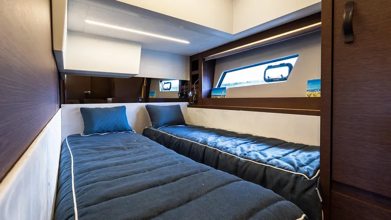  Yacht Photos Pics Luxurious twin cabin interior of 2019 Prestige 520 Flybridge yacht.