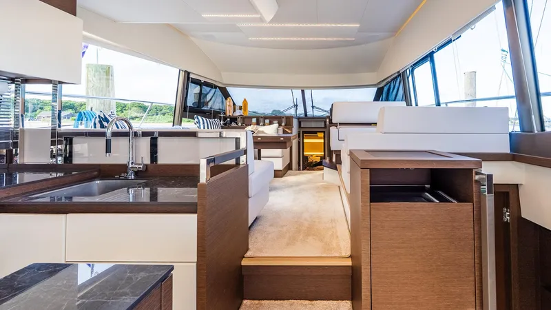  Yacht Photos Pics Luxurious interior of 2019 Prestige 520 Flybridge yacht with modern design and spacious layout.