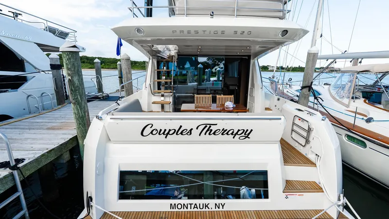  Yacht Photos Pics 2019 Prestige 520 Flybridge yacht named "Couples Therapy" docked in Montauk, NY.