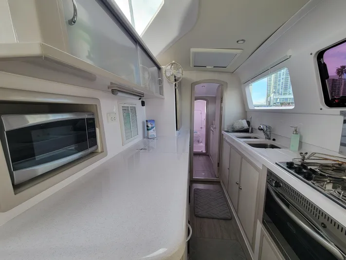  Yacht Photos Pics Interior of 2019 Seawind 1160 Lite catamaran kitchen with modern appliances.