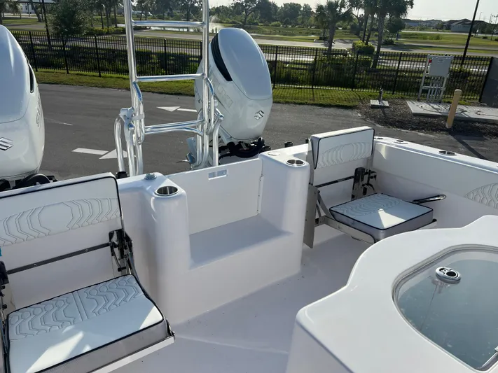  Yacht Photos Pics 2025 Twin Vee 280 GFX2 CC boat interior with seating and dual engines.