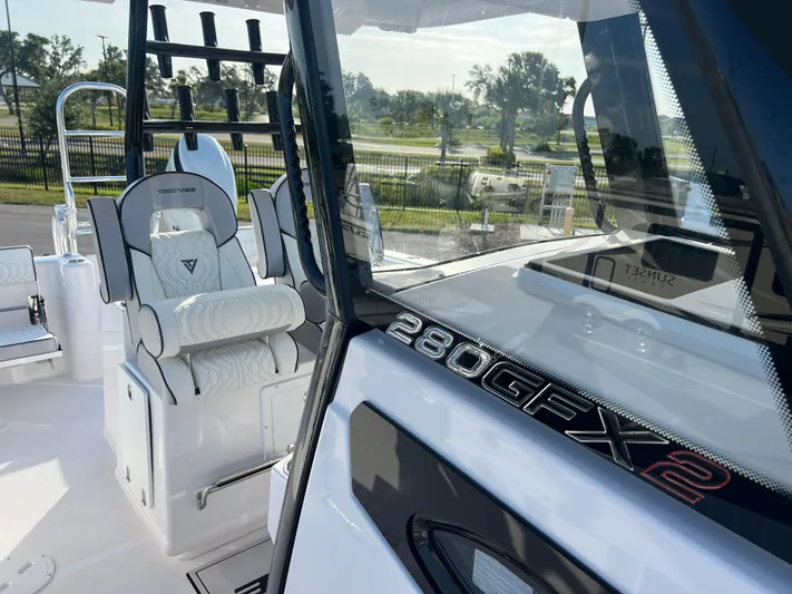  Yacht Photos Pics 2025 Twin Vee 280 GFX2 CC boat interior with sleek seating and modern design.