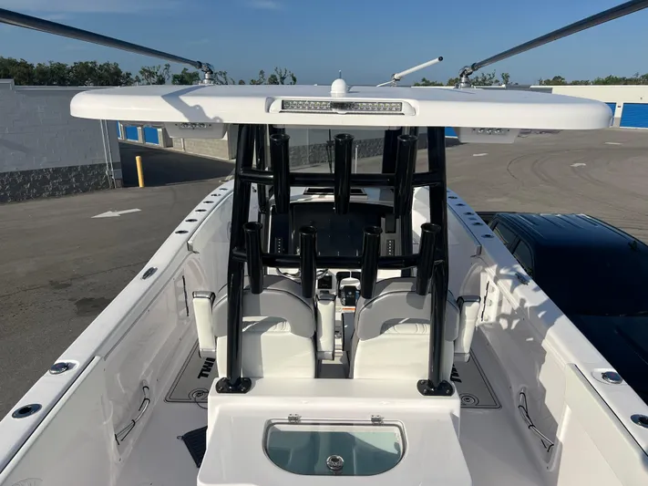  Yacht Photos Pics 2025 Twin Vee 280 GFX2 CC boat, center console, sleek design, white and black accents.