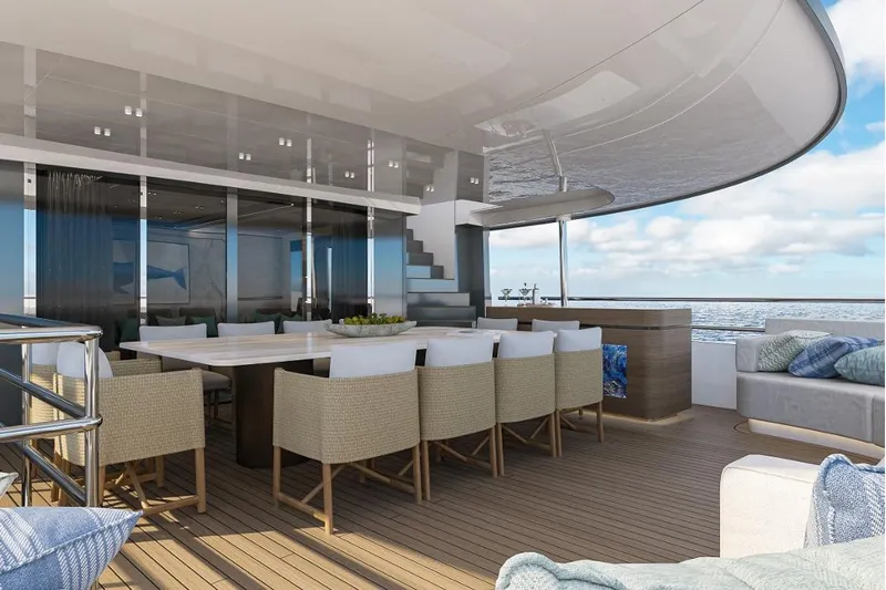 Stella Azura Yacht Photos Pics Luxurious outdoor dining area on 2026 Falcon Yachts 45, featuring elegant seating and ocean views.