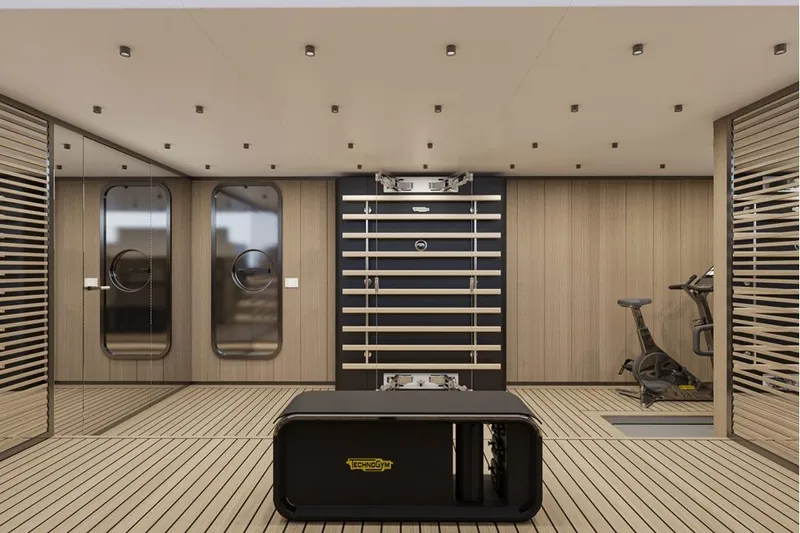 Stella Azura Yacht Photos Pics Luxurious gym interior on 2026 Falcon Yachts 45, featuring modern equipment and sleek design.