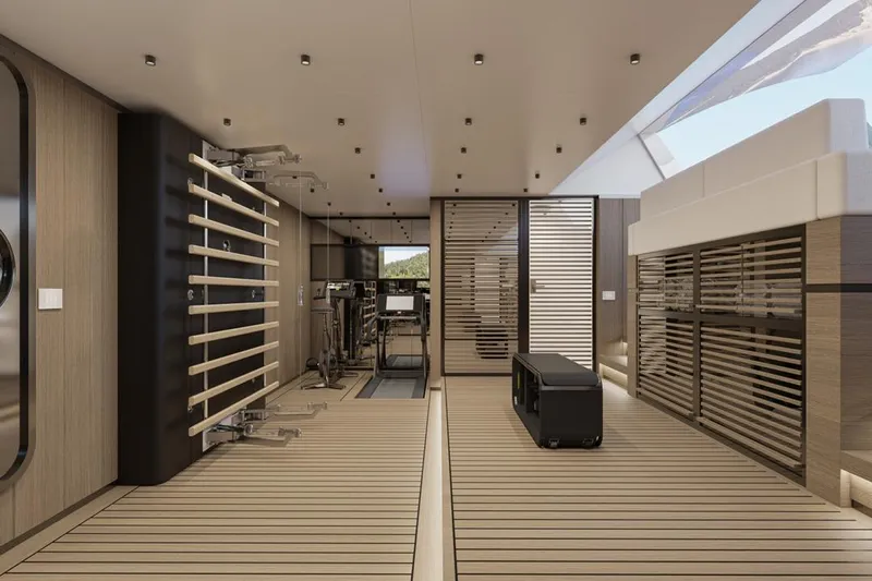 Stella Azura Yacht Photos Pics Luxurious interior of 2026 Falcon Yachts 45, featuring modern design and fitness equipment.