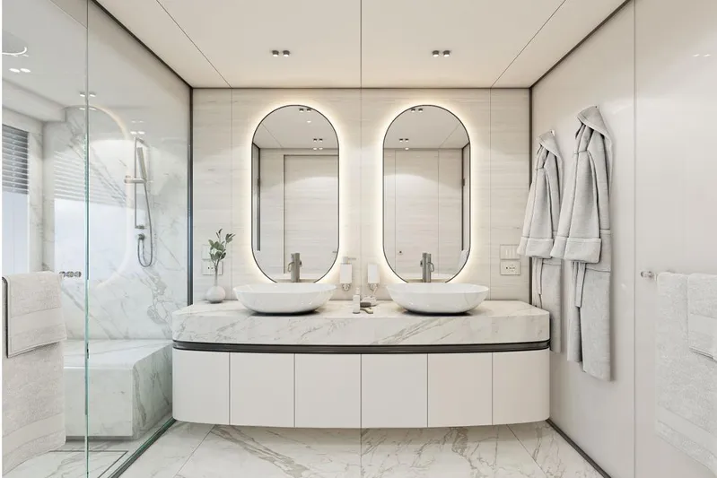 Stella Azura Yacht Photos Pics Luxurious bathroom in 2026 Falcon Yachts 45, featuring dual sinks and elegant marble design.