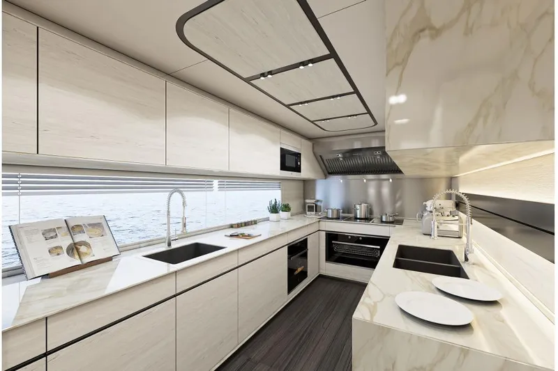 Stella Azura Yacht Photos Pics Luxurious modern kitchen in 2026 Falcon Yachts 45, featuring sleek cabinetry and ocean view.