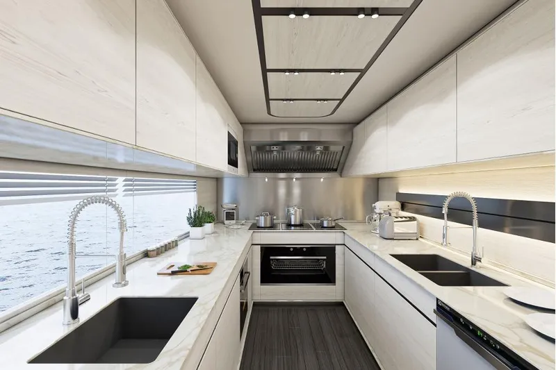 Stella Azura Yacht Photos Pics Modern kitchen interior on 2026 Falcon Yachts 45, featuring sleek design and ocean view.