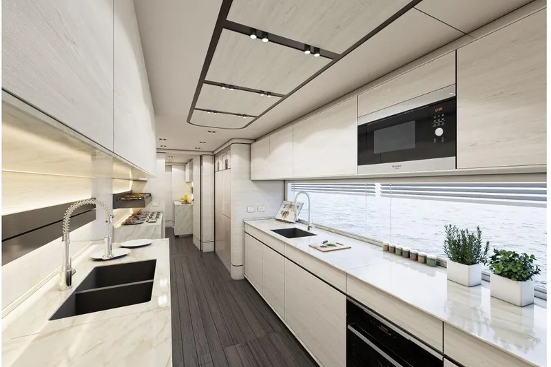 Stella Azura Yacht Photos Pics Luxurious modern kitchen in 2026 Falcon Yachts 45, featuring sleek design and ocean views.