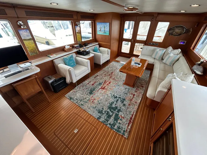 Novia II Yacht Photos Pics Luxurious interior of 2020 Marlow 66E yacht with elegant seating and decor.