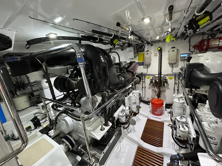 Novia II Yacht Photos Pics Engine room of a 2020 Marlow 66E yacht, featuring complex machinery and equipment.