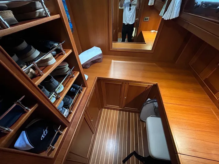 Novia II Yacht Photos Pics Luxurious Marlow 66E yacht interior with wooden flooring and shoe storage, 2020 model.