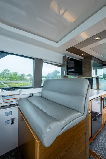  Yacht Photos Pics 2020 Tiara Yachts C44 Coupe interior with modern seating and sleek design.