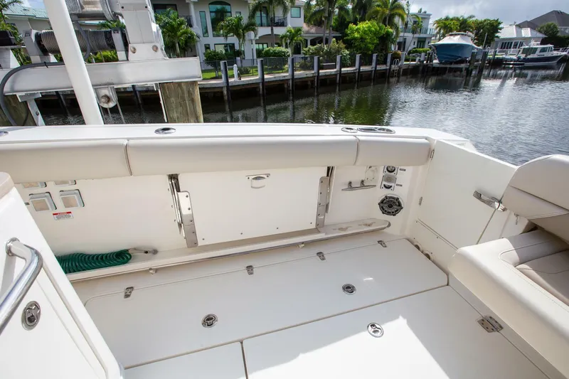 Double Nickel Yacht Photos Pics 2023 Boston Whaler 380 Outrage boat interior, featuring spacious seating and modern amenities.