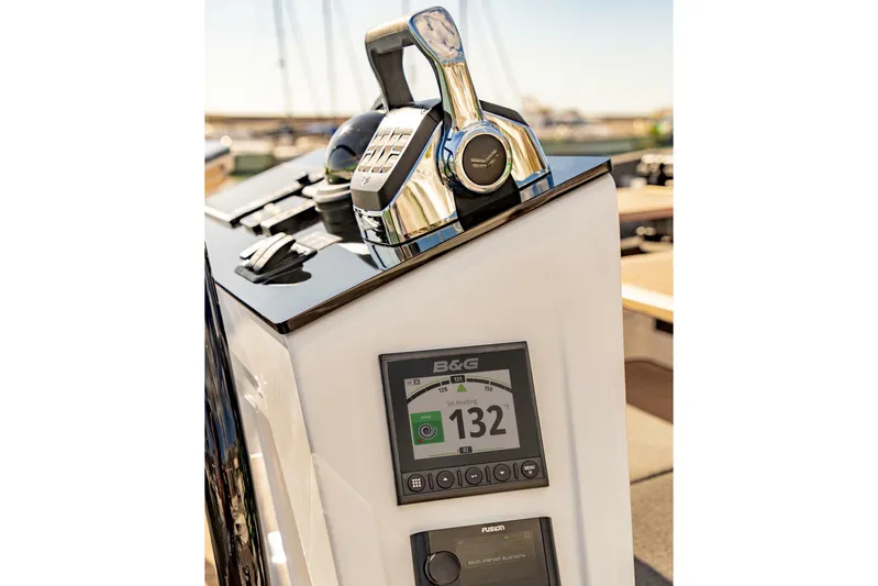 San-197 Yacht Photos Pics Control panel of 2025 Hanse 460 yacht with navigation display and throttle.