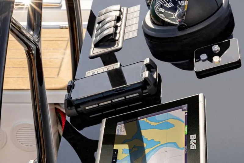 San-197 Yacht Photos Pics Control panel of 2025 Hanse 460 yacht with navigation equipment and compass.