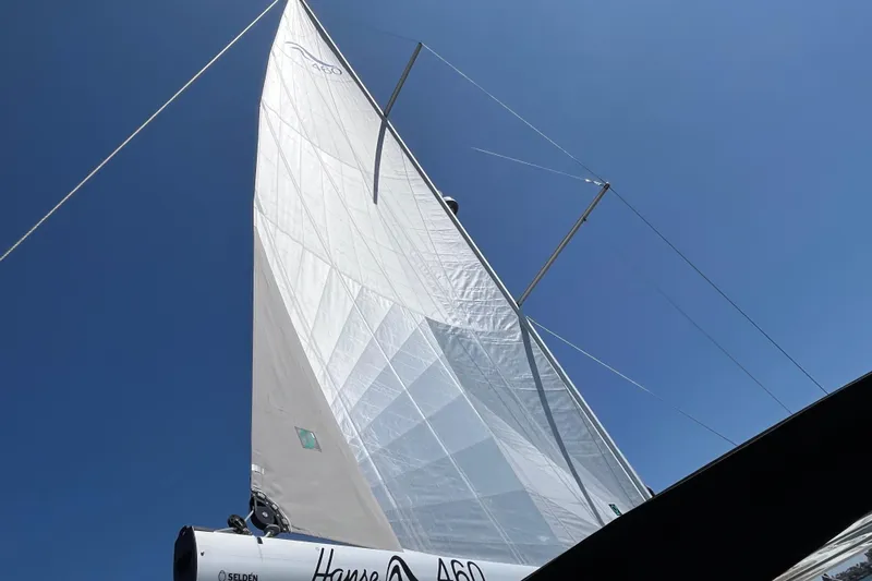 San-197 Yacht Photos Pics Sailing yacht Hanse 460, 2025 model, with sails unfurled against a clear blue sky.