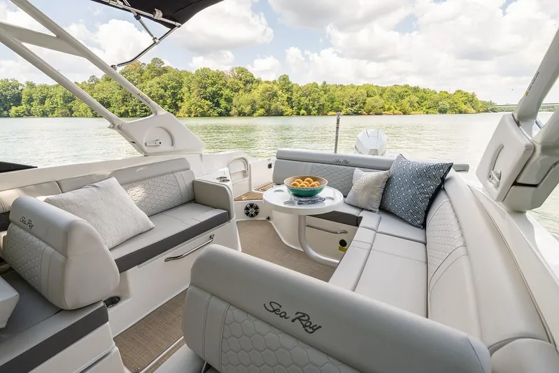  Yacht Photos Pics Manufacturer Provided Image: 2023 Sea Ray SDX 270 Outboard boat interior with plush seating and scenic lake view.