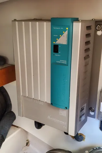 Puffin Yacht Photos Pics Legacy 32 battery charger, 2008 model, mounted on a wall.