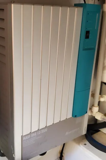 Puffin Yacht Photos Pics Legacy 32 inverter, 2008 model, mounted on a wall with visible wiring.