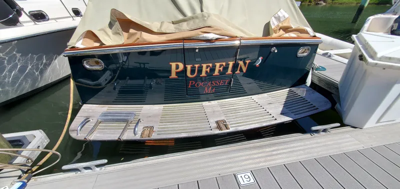 Puffin Yacht Photos Pics Legacy 32 boat named "Puffin" docked at a marina, 2008 model.