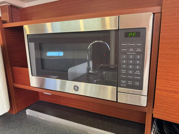 Dreamcatcher Yacht Photos Pics Microwave oven in 2018 Hanse 348 yacht kitchen, stainless steel finish.