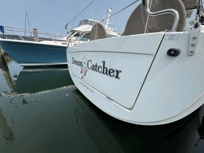 Dreamcatcher Yacht Photos Pics 2018 Hanse 348 sailboat named "Dream Catcher" docked at a marina.