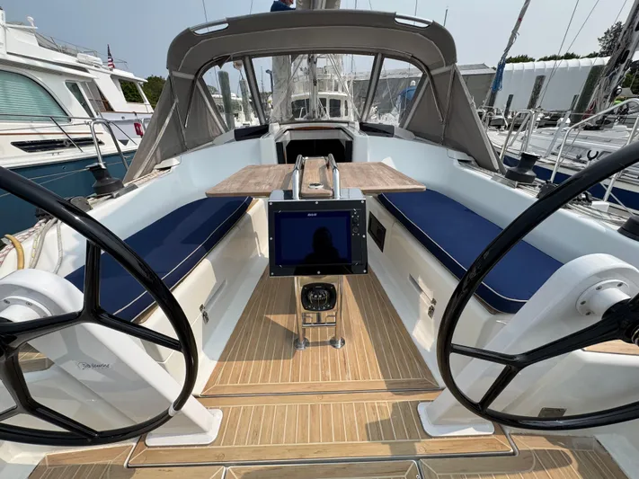 Dreamcatcher Yacht Photos Pics 2018 Hanse 348 yacht cockpit with dual steering wheels and navigation system.