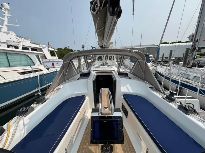 Dreamcatcher Yacht Photos Pics 2018 Hanse 348 sailboat with blue seating, docked at a marina.