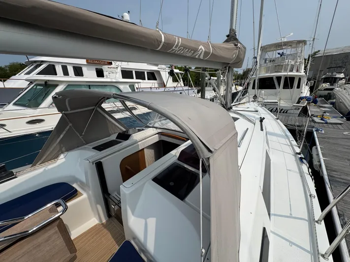 Dreamcatcher Yacht Photos Pics 2018 Hanse 348 sailboat docked, featuring a sleek design and spacious cockpit area.