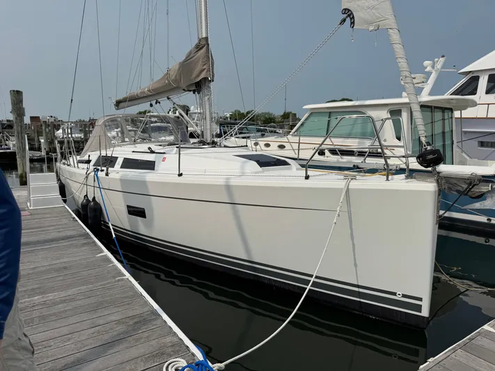 Dreamcatcher Yacht Photos Pics 2018 Hanse 348 sailboat docked at a marina, side view.
