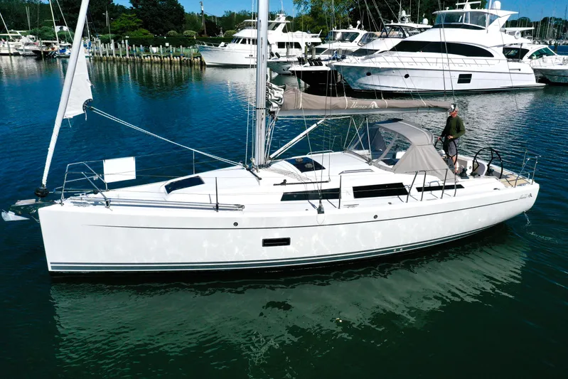 Dreamcatcher Yacht Photos Pics 2018 Hanse 348 sailboat docked in a marina, surrounded by other yachts.