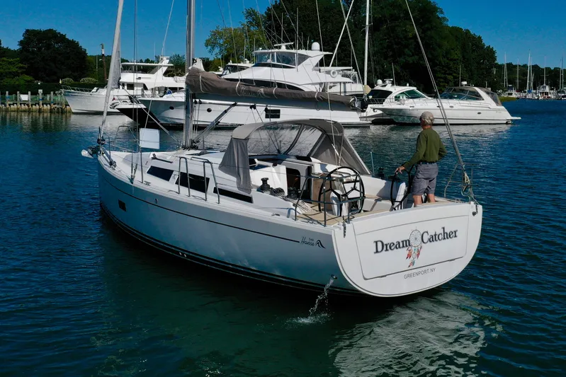 Dreamcatcher Yacht Photos Pics 2018 Hanse 348 sailboat "Dream Catcher" navigating marina waters, Greenport, NY.