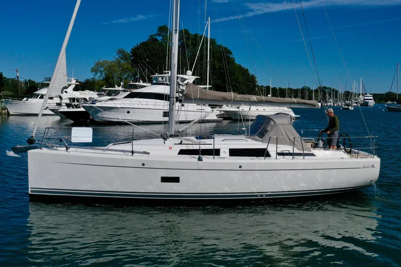 Dreamcatcher Yacht Photos Pics 2018 Hanse 348 sailboat docked in a marina with clear blue skies.