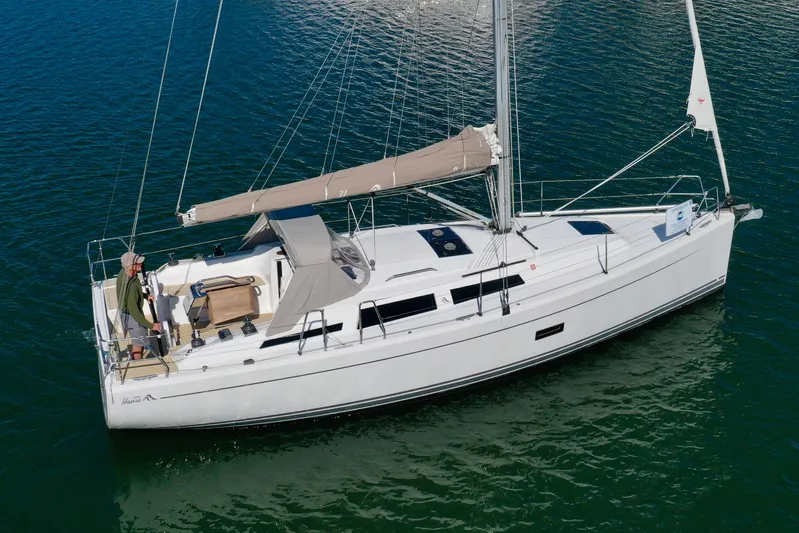 Dreamcatcher Yacht Photos Pics 2018 Hanse 348 sailboat on calm water, featuring sleek design and spacious deck.