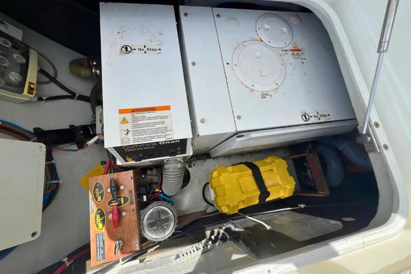 Take It Easy Yacht Photos Pics Engine compartment of a 2018 Lagoon 450 F catamaran with visible components and wiring.