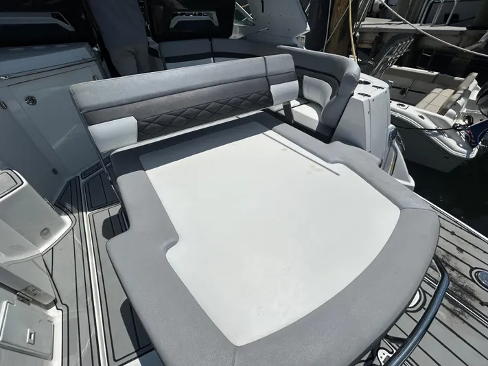 Aguabendita Yacht Photos Pics 2019 Monterey 345 Sport Yacht with spacious, cushioned seating area on deck.