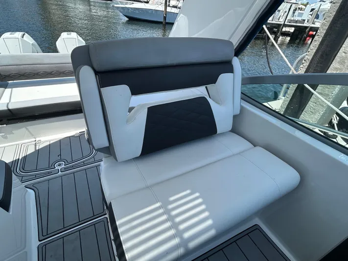 Aguabendita Yacht Photos Pics 2019 Monterey 345 Sport Yacht interior seating with modern design and waterfront view.