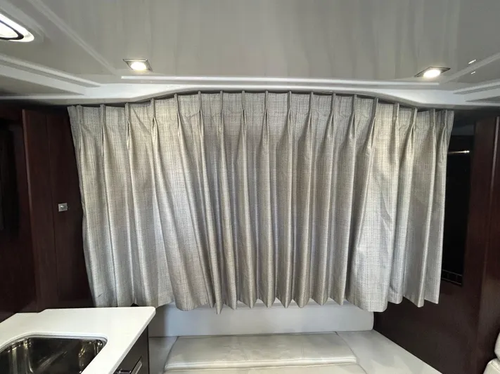 Aguabendita Yacht Photos Pics Interior of 2019 Monterey 345 Sport Yacht with elegant curtains and modern lighting.