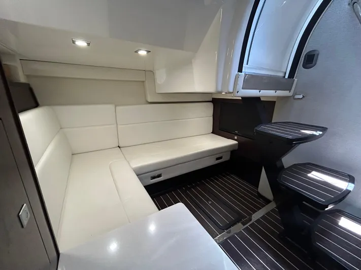 Aguabendita Yacht Photos Pics Interior of 2019 Monterey 345 Sport Yacht with sleek seating and modern design.
