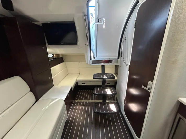 Aguabendita Yacht Photos Pics 2019 Monterey 345 Sport Yacht interior with modern seating and sleek design.