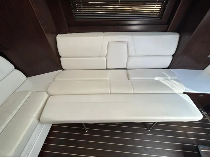 Aguabendita Yacht Photos Pics Luxurious white seating in 2019 Monterey 345 Sport Yacht interior.